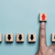 Finger pointing upward block symbolizing business growth with IT solutions in Dallas